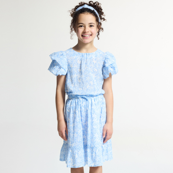 تنورة زرقاء اللون مطبوعة وبها كشكشة للفتيات